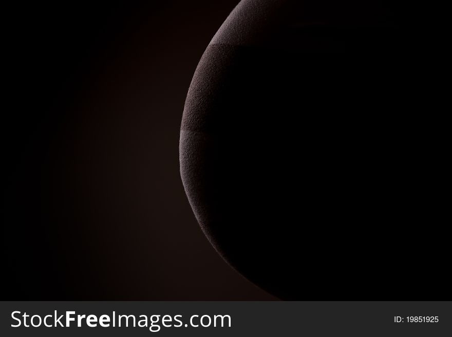 pregnant woman belly lighted in a way to look like a moon set, on a black background. pregnant woman belly lighted in a way to look like a moon set, on a black background.