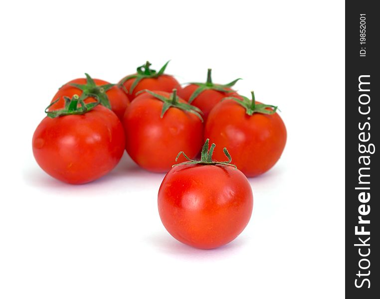 Red Tomatoes Isolated On A White