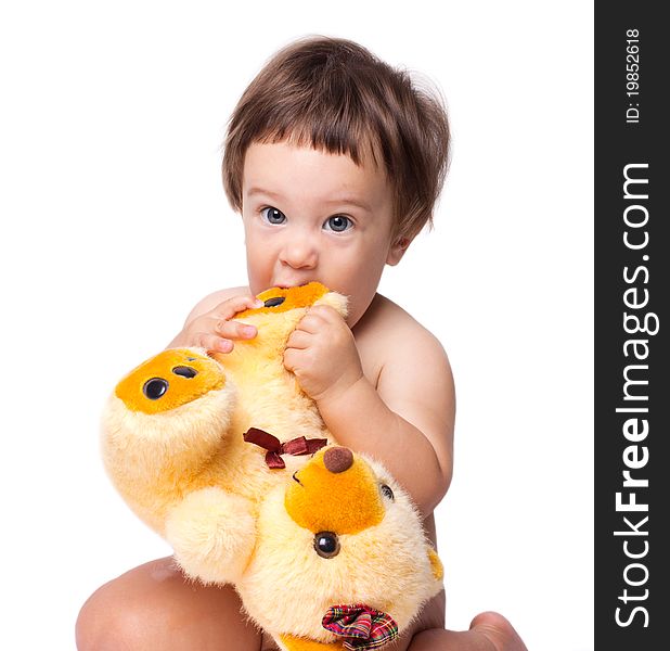 Little boy with toy isolated on the white