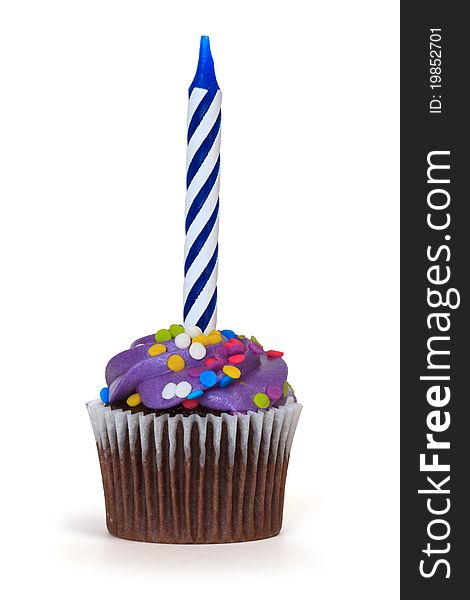 Cupcake with candle over white background