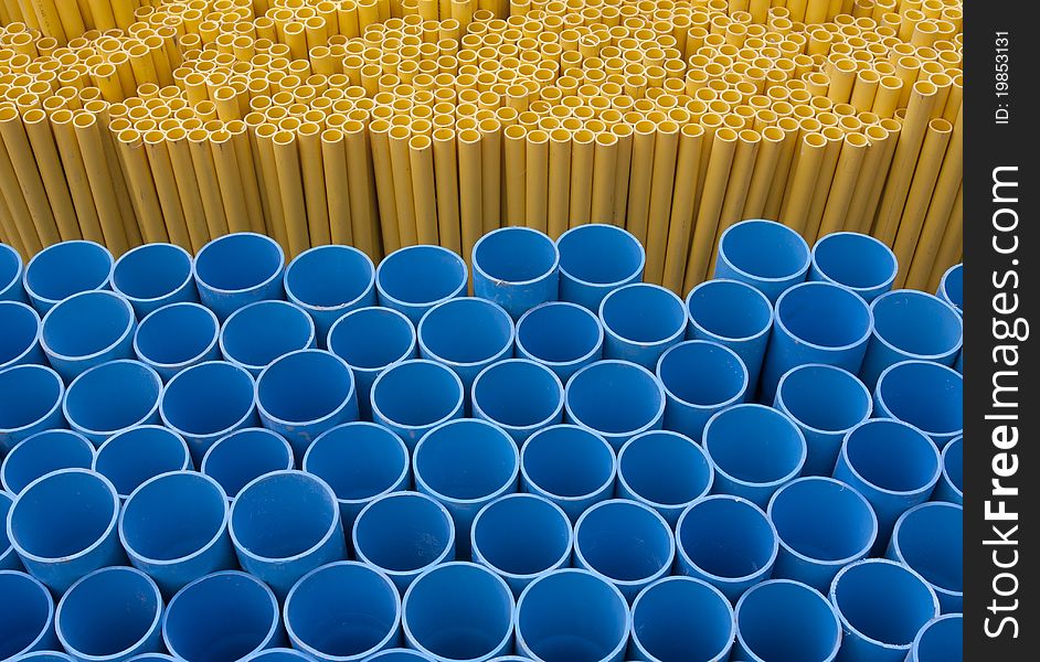 Blue and yellow pvc pipes for construction. Blue and yellow pvc pipes for construction.