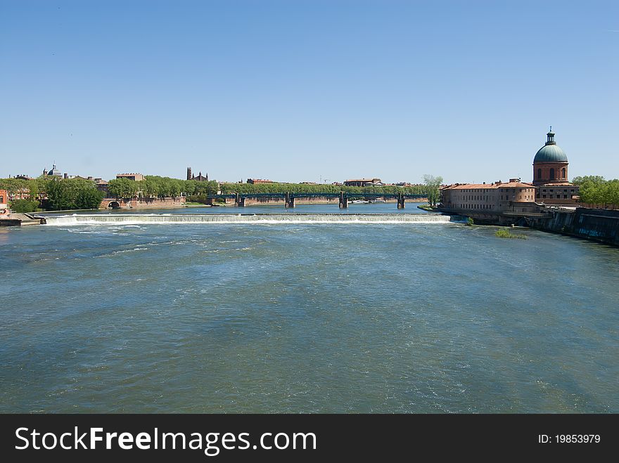 Scenery of Garonne river city Toulouse, France. Toulouse, known as the Ville Rose (Pink City) for its distinctive brick architecture.