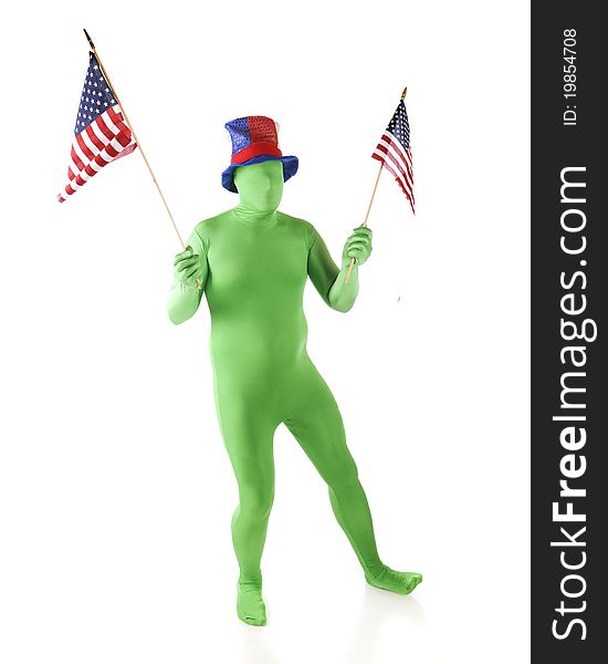 A green morph man carrying American flags while wearing a patriotic hat. Isolated on white. A green morph man carrying American flags while wearing a patriotic hat. Isolated on white.