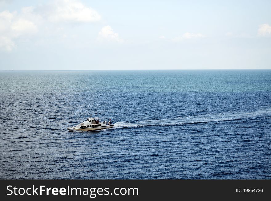 A  speed boat on the sea.