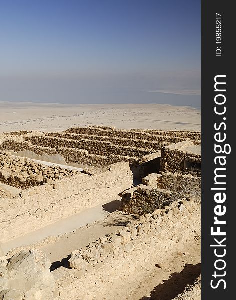 The ancient fortress of Masada in Israel.  Built by King Herod the Great, Masada was used by the Jewish in their rebellion against the Romans.  Located at the eastern edge of the Judean Desert. The ancient fortress of Masada in Israel.  Built by King Herod the Great, Masada was used by the Jewish in their rebellion against the Romans.  Located at the eastern edge of the Judean Desert.