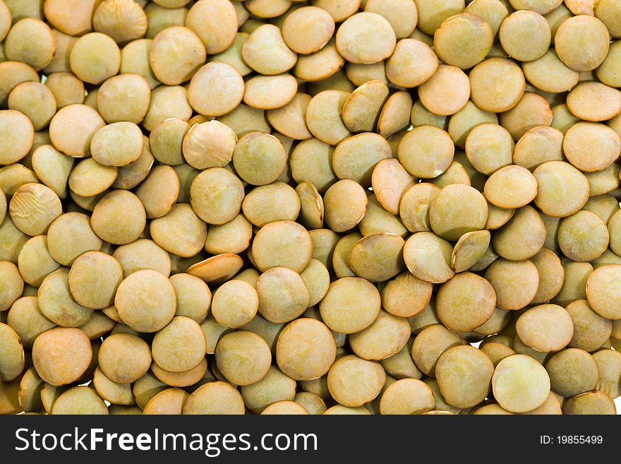 The piled various grains of dry lentil. The piled various grains of dry lentil