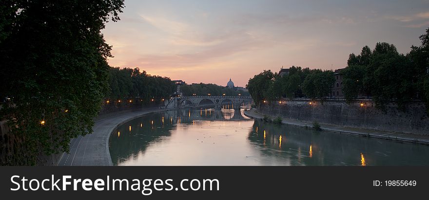Panoramic view of St. Peter's Basilica and the Vatican City (with the river Tiber winding around it) - Rome, Italy