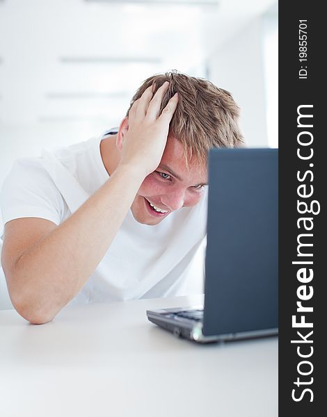 Student With Laptop Computer In  Library