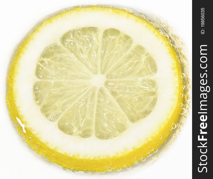 Lemon with bubbles on white background. Lemon with bubbles on white background