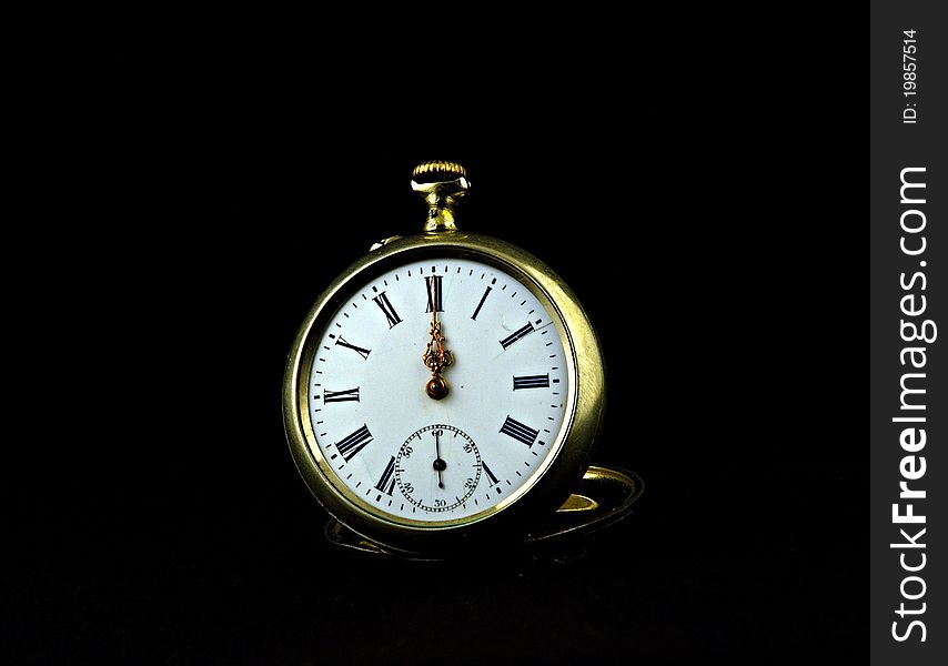 Gold clock on black background. Gold clock on black background