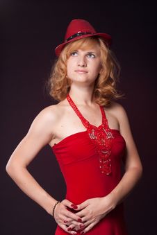 Red-haired Girl In A Red Dress And Red Hat Royalty Free Stock Photo Red-haired Girl In A Red Dress And Red Hat Royalty Free Stock Photo