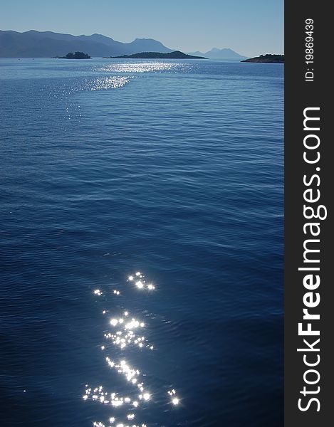 Reflections on the Adriatic Sea showing some of the smaller island of the central Dalmatian archipelago, Croatia. Reflections on the Adriatic Sea showing some of the smaller island of the central Dalmatian archipelago, Croatia