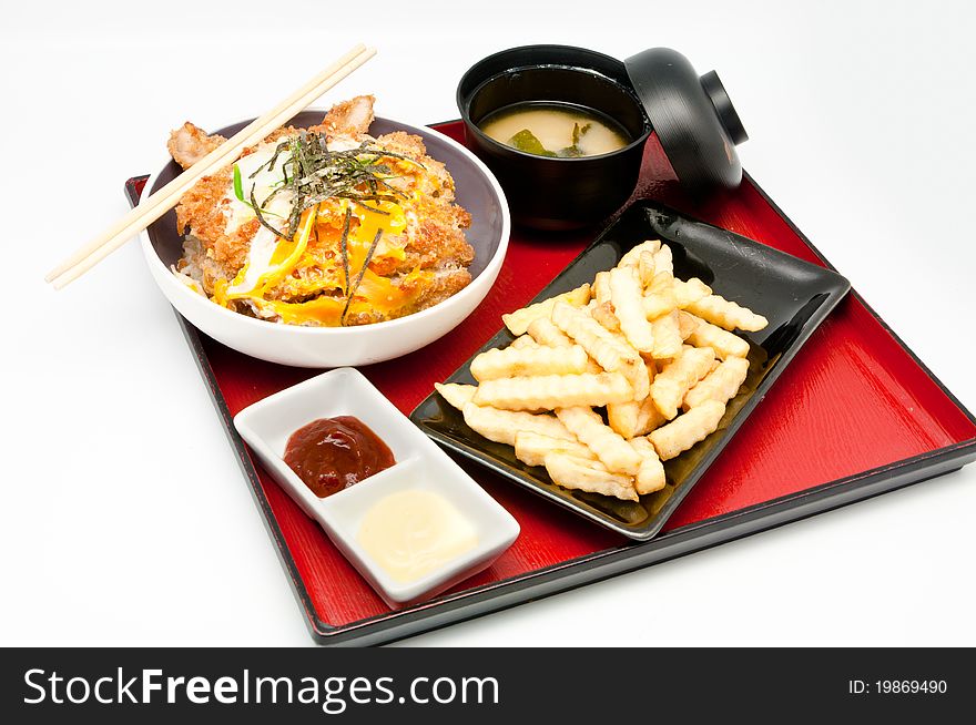 Japanese Cuisine and French fries on whit background