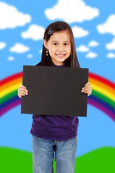 A Smiling Girl Holding A Blank Black Board Royalty Free Stock Photos A Smiling Girl Holding A Blank Black Board Royalty Free Stock Photos