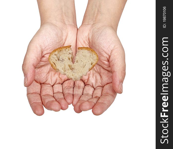 Open beggar hands receiving bread slice, in heart shape