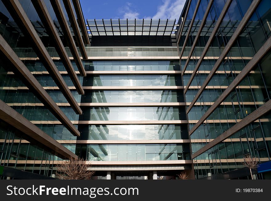 Modern office building with a lot of glasses on sunny day. Modern office building with a lot of glasses on sunny day