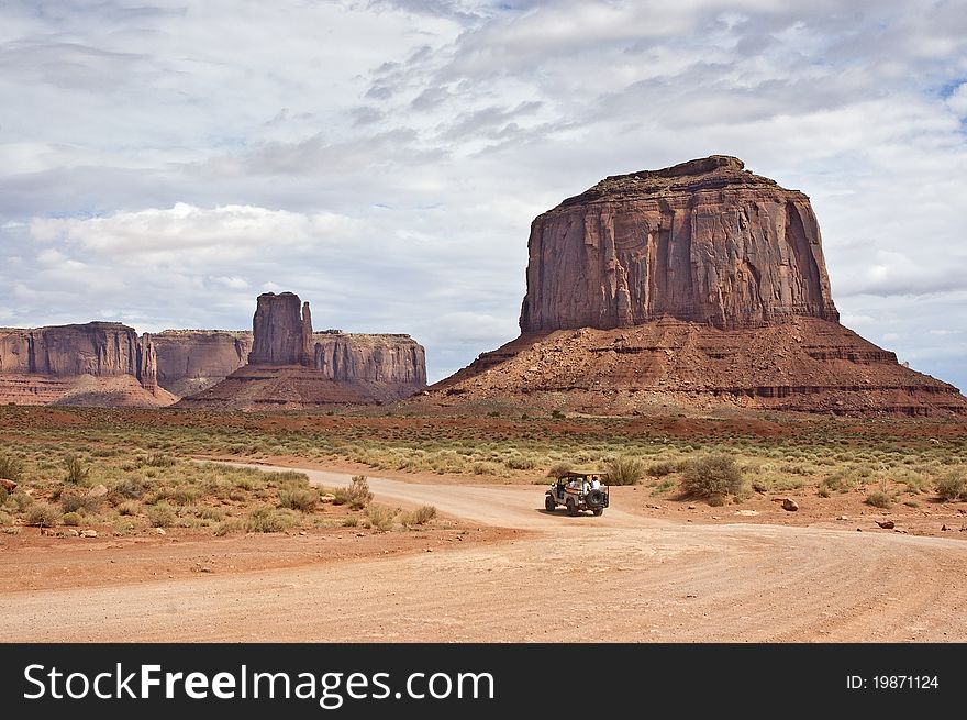 Tourists viewing sights in Monument Valley. Tourists viewing sights in Monument Valley