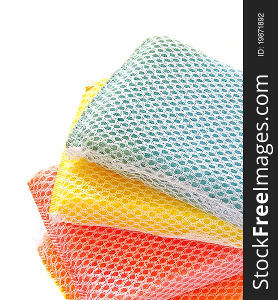 Stack of colorful sponges isolated on white background. Stack of colorful sponges isolated on white background
