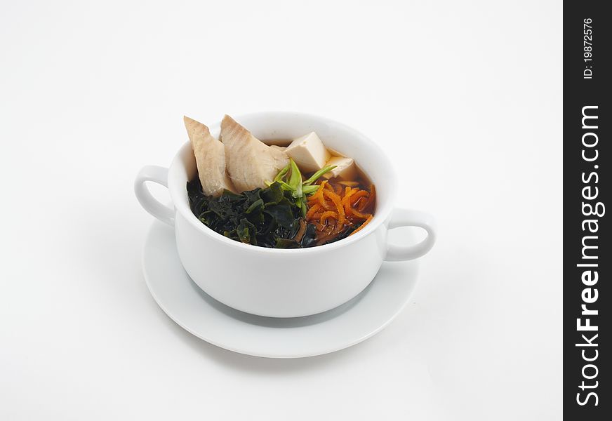 Soup photo in a bowl on a white background. Soup photo in a bowl on a white background