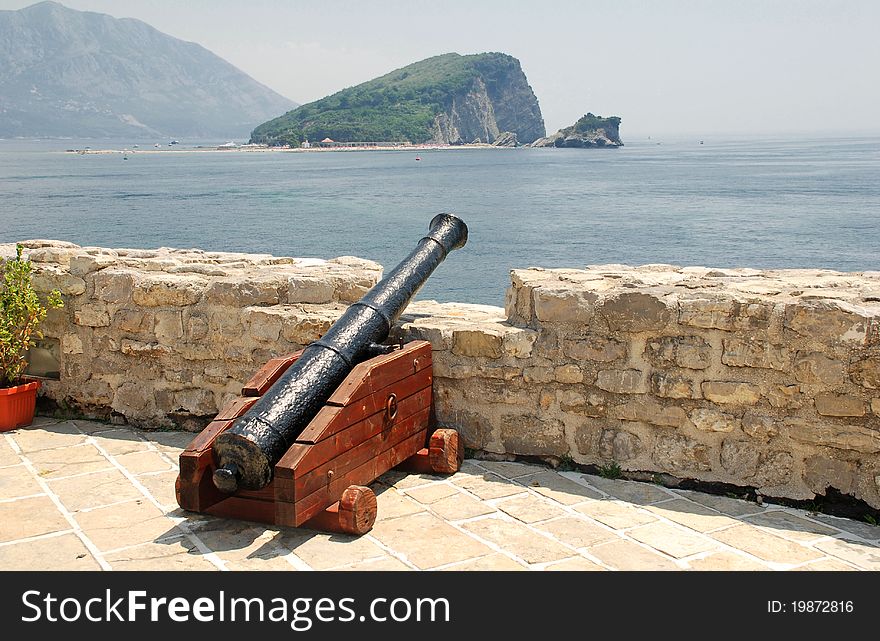 An old cannon in a fortress Budva with Adriatic sea view (Montenegro)