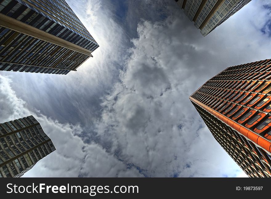 Buildings under the cloudy sky. Buildings under the cloudy sky