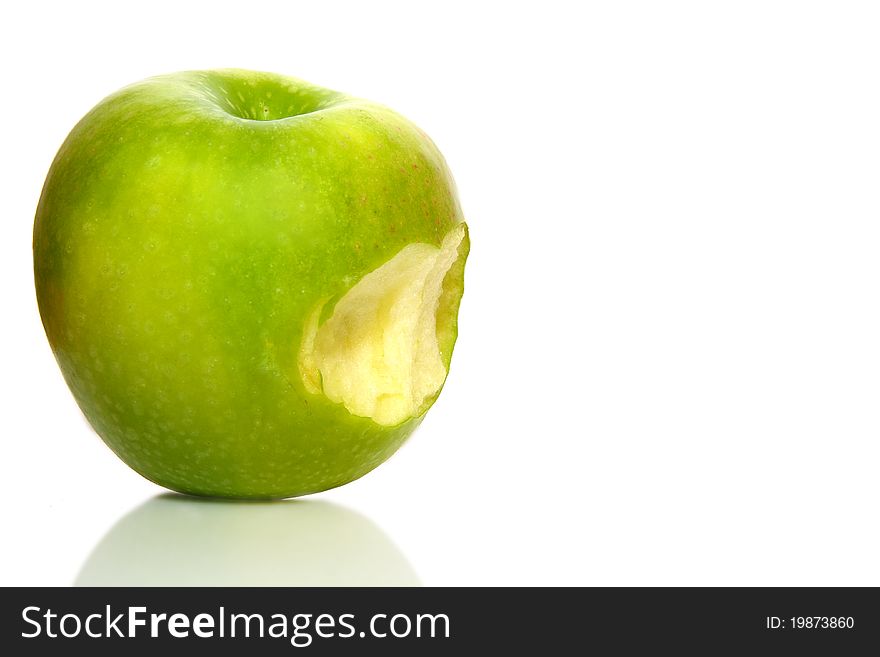 Fresh apple on isolated white background. Organic, healthy bitten green apple