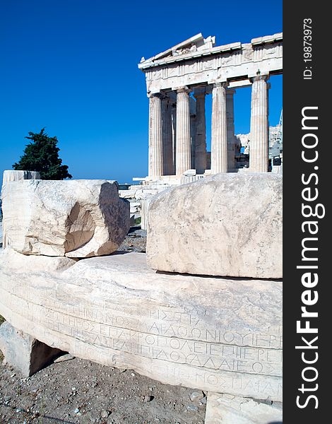 Old scripts on stones near Parthenon on Acropolis, Athens, Greece