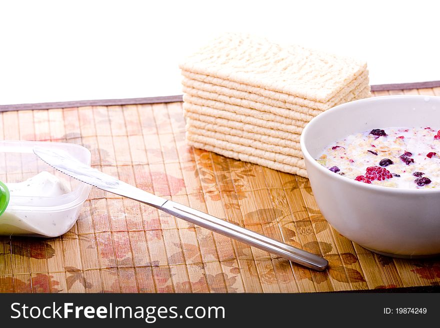 Healthy breakfest with cottage cheese on crispbread and muesli