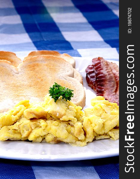 Healthy and colorful breakfast of eggs,toast and bacon. Healthy and colorful breakfast of eggs,toast and bacon