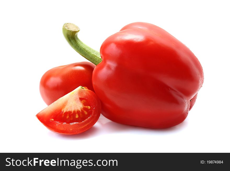 Tomatoes And Peppers On A White Background