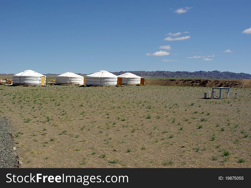 A camp of yurts in the desert of Gobi, in Mongolia. A camp of yurts in the desert of Gobi, in Mongolia