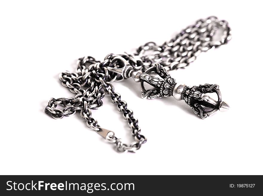 Silver chain with a pendant - tibetan vadjra. Silver chain with a pendant - tibetan vadjra.