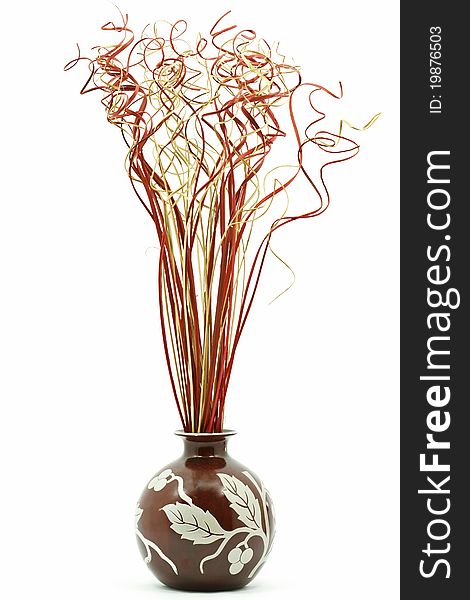 Multicolored bamboo bouquet in vase isolated on white
