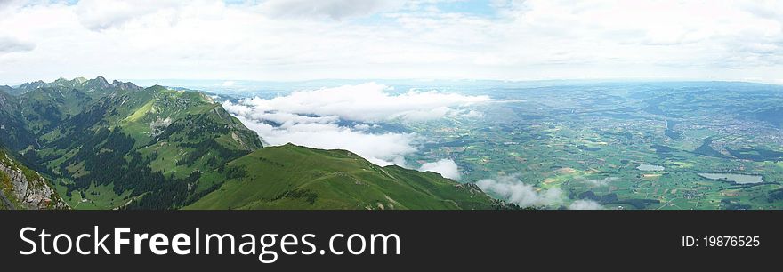 This is a panorama from the top of a mountain overlooking part of Switzerland. This is a panorama from the top of a mountain overlooking part of Switzerland.