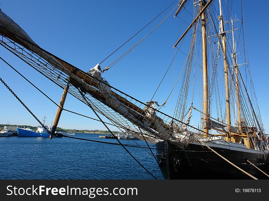 Old beautiful vintage wooden sail boat tall ship marine background. Old beautiful vintage wooden sail boat tall ship marine background