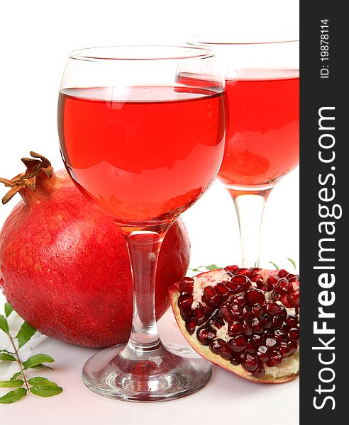 Fresh fruit and juice on a white background