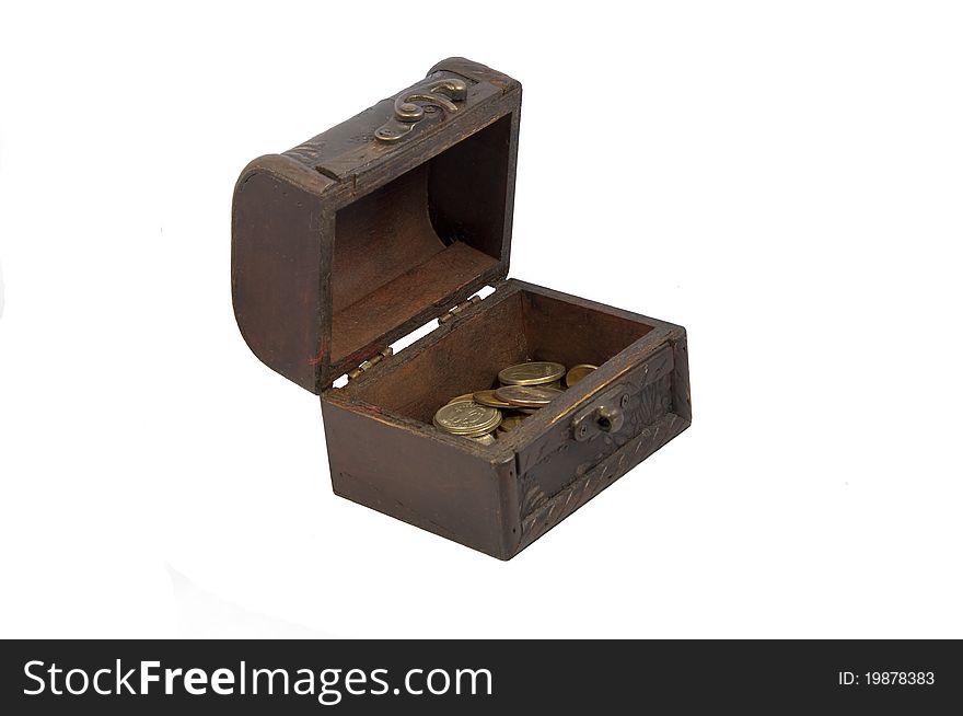 Ancient trunk with brass loops half filled with coins. Ancient trunk with brass loops half filled with coins