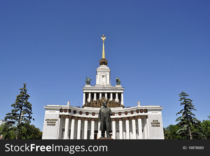 View of the pavilion on the Peoples&#x27; Friendship Exhibition Center with the monument of Lenin. View of the pavilion on the Peoples&#x27; Friendship Exhibition Center with the monument of Lenin