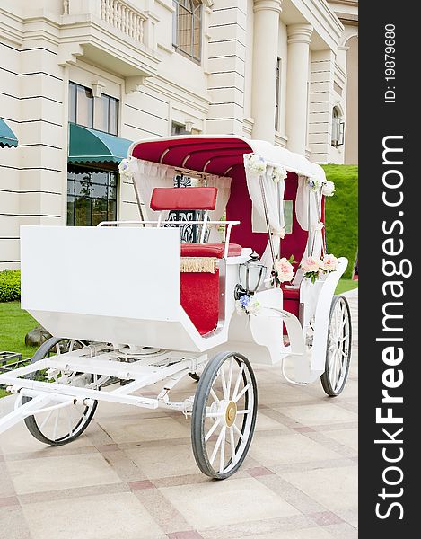 A beautiful white Old Horse Carriage
