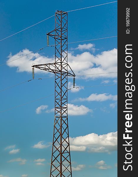 High-voltage tower against the sky