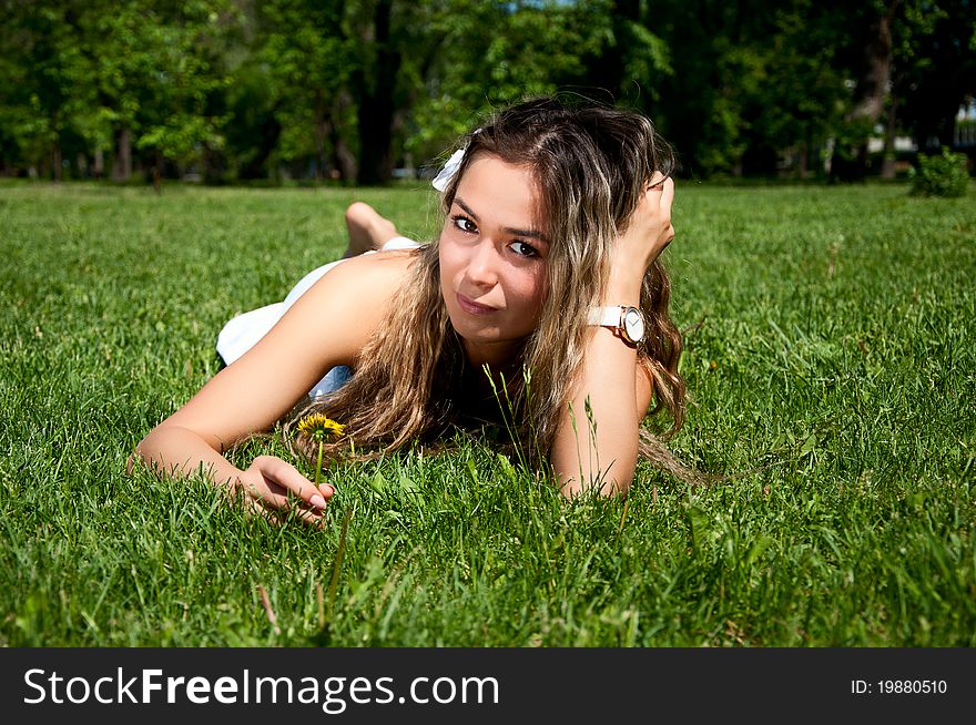 Beautiful Young Woman On Field In Summer