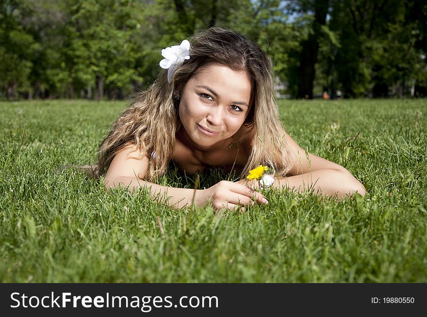 Beautiful Young Woman On Field In Summer