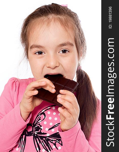 Foto-little girl eating chocolate