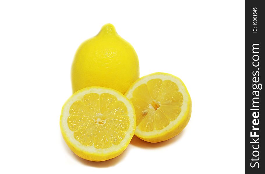 Fresh juicy lemons close up isolated on white