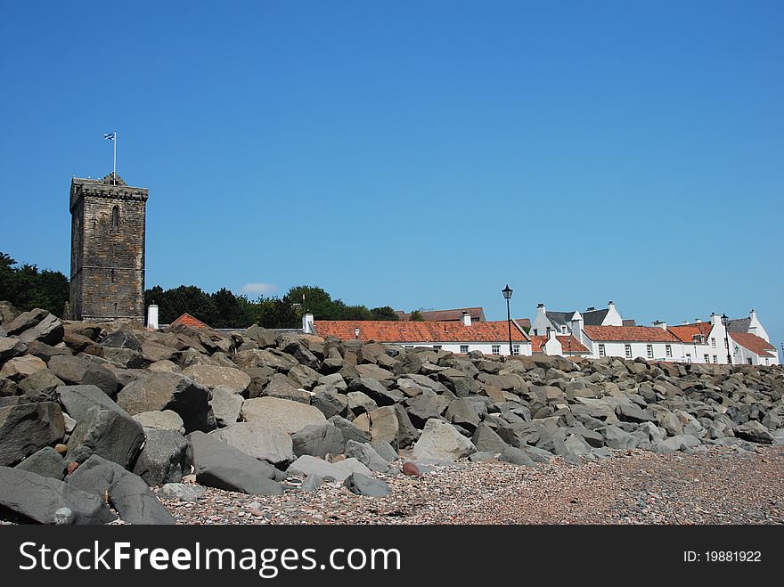 An old ruined tower above the shore line at the Fife coastal village of Dysart. An old ruined tower above the shore line at the Fife coastal village of Dysart