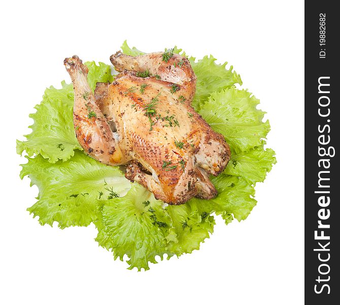 Grilled chicken with lettuce leaves, isolated on a white background