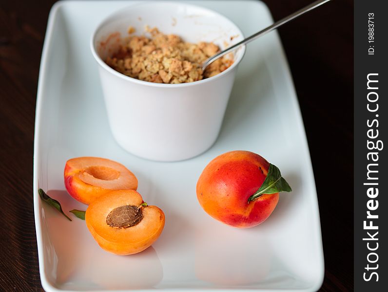 Crispy crumble with apricots in individual portion