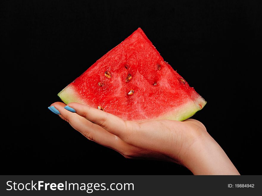 Water-melon on hand. Isolated