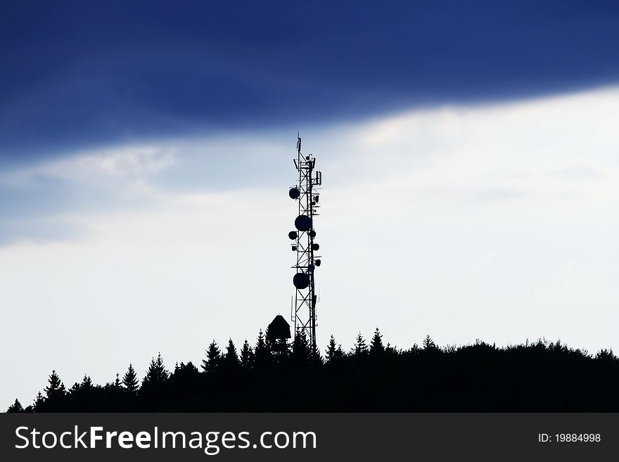 Radio antena over sunset background