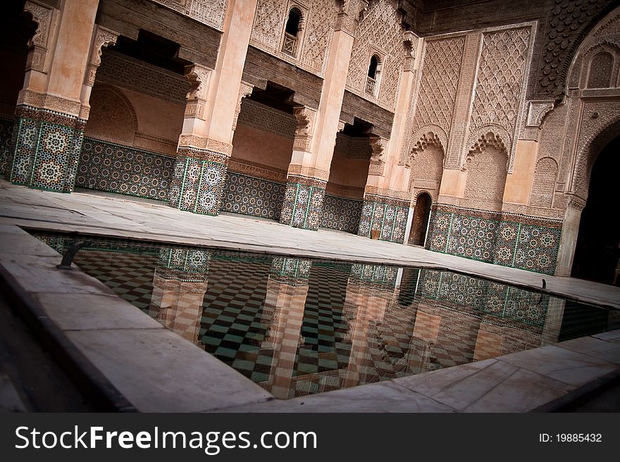 Prime view of the center of the Medersa, with its beautiful pool of undisturbed water. Prime view of the center of the Medersa, with its beautiful pool of undisturbed water